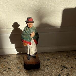 Handcrafted Figurine with Green and Red Accents